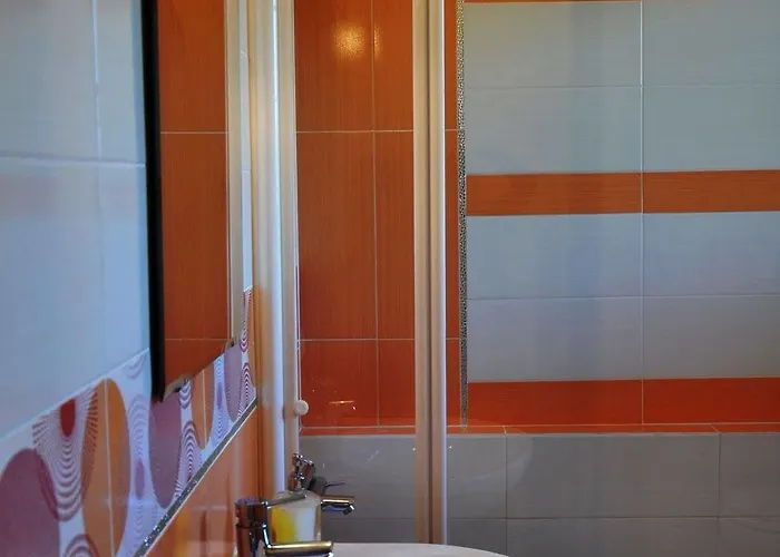 Отель Notti Romane Infernetto